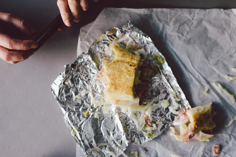 Kate Bernot photographing the legendary sandwich itself.